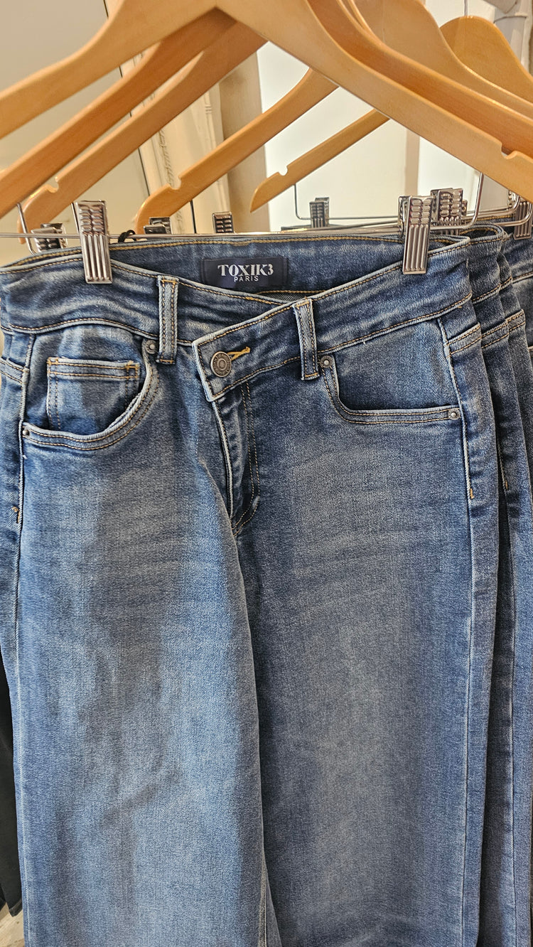 Toxik asymmetric waistband stretchy wide leg jeans