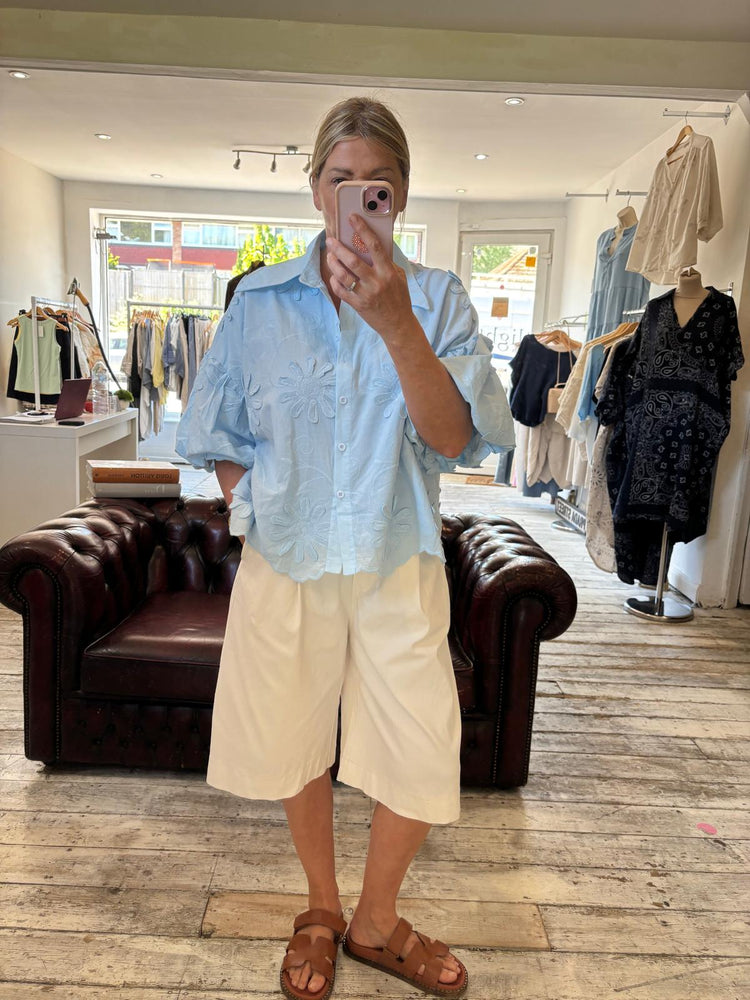 ARABELLA EMBROIDERED FLORAL SCALLOPED HEM SHIRT IN POWDER BLUE
