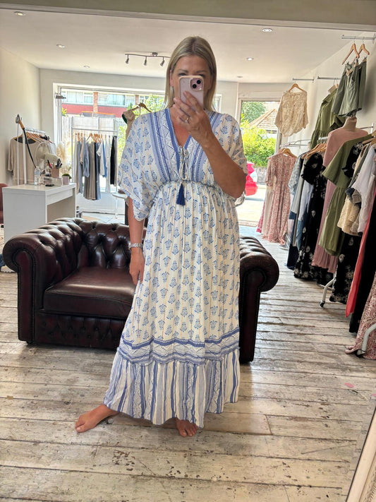 EDEN V-NECK PATTERNED TASSEL MIDI DRESS