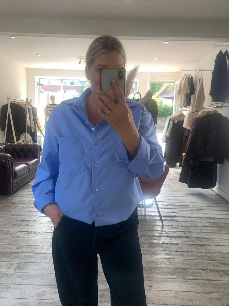 Classic button-up blue shirt