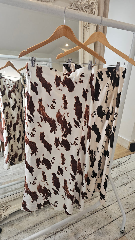 Abbey Cow Print Bias Midi Skirt in camel