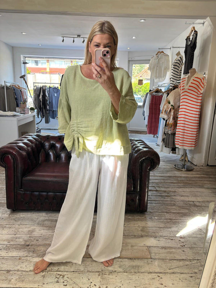 POPPY SIDE RUCHED LINEN BLEND BLOUSE IN PISTACHIO