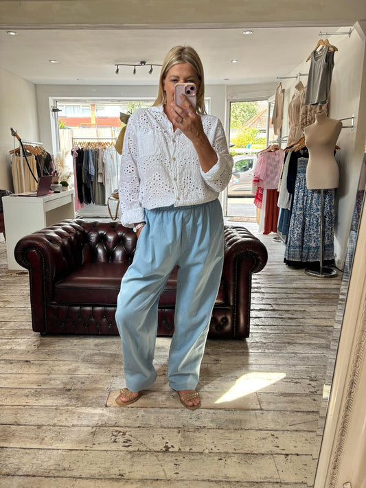 Frankie high-waisted light wash denim style trousers