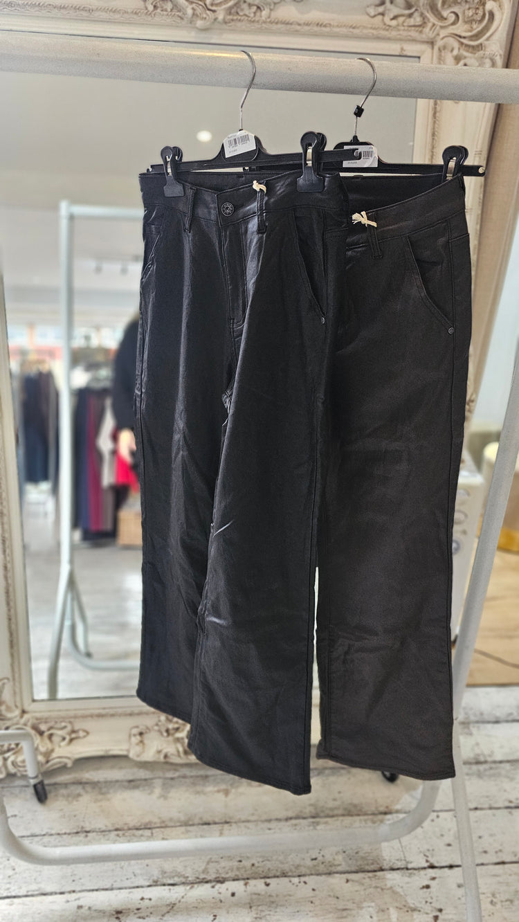 Kate leather look flare trousers in black