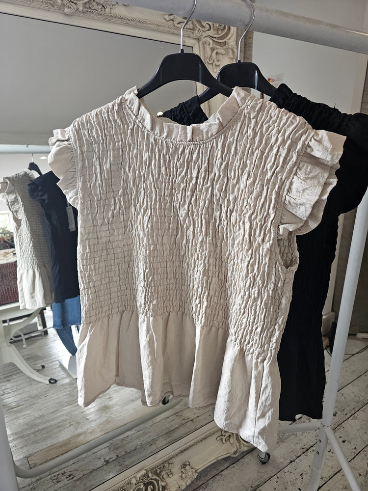 Vivienne smocked peplum top in beige