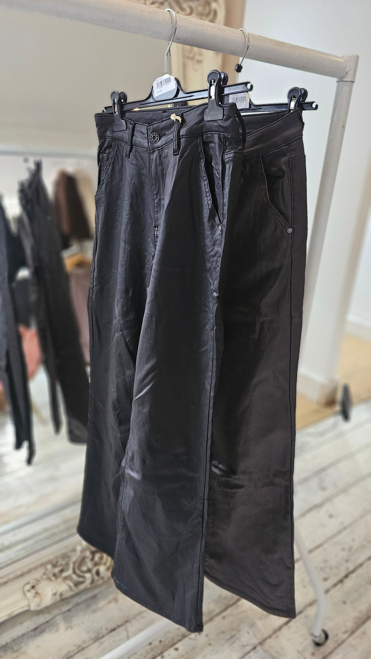 Kate leather look flare trousers in black