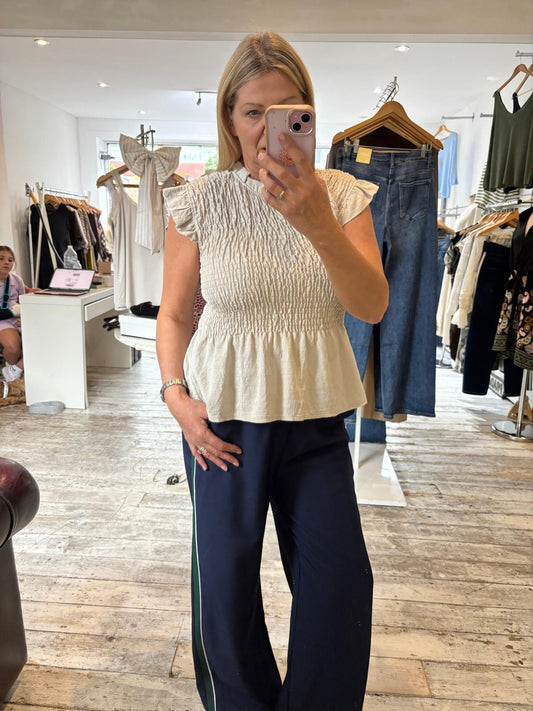 Vivienne smocked peplum top in beige