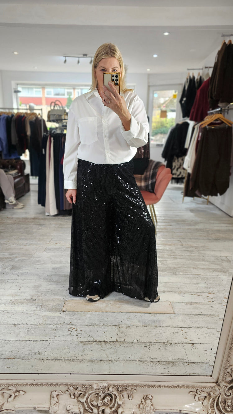 Gloria elasticated waist sequin trousers in black