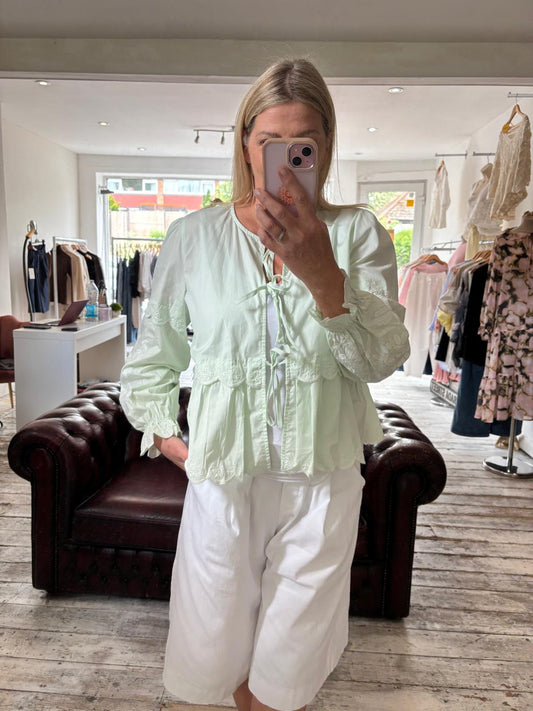 NELLIE COTTON EMBROIDERY TIE UP BLOUSE IN PISTACHIO