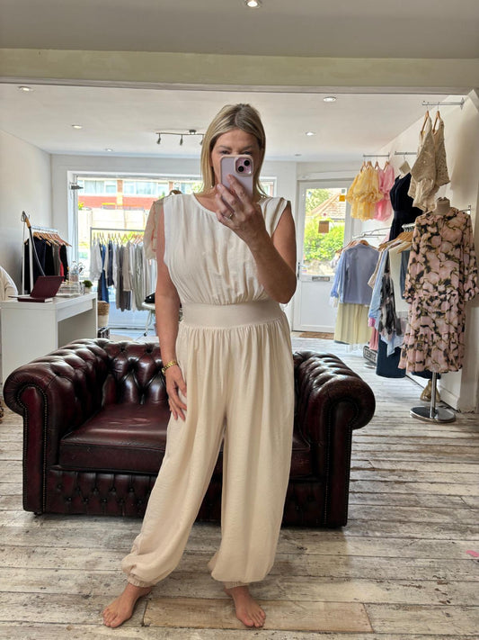 HOLLIE ELASTICATED SLEEVELESS HAREM JUMPSUIT IN BEIGE