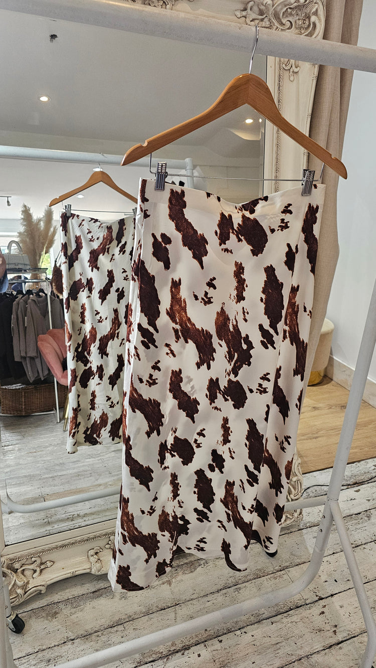 Abbey Cow Print Bias Midi Skirt in camel