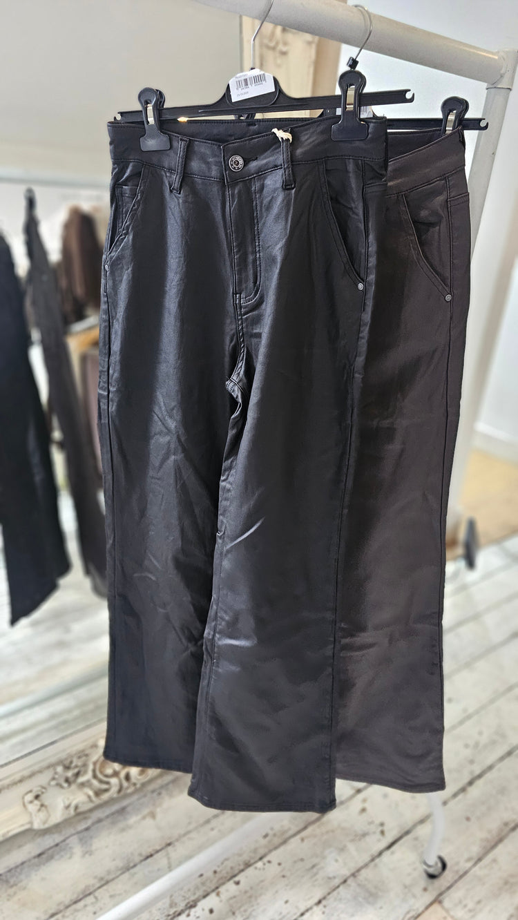 Kate leather look flare trousers in black