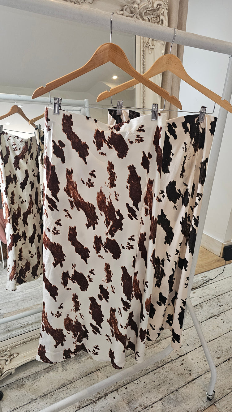 Abbey Cow Print Bias Midi Skirt in camel