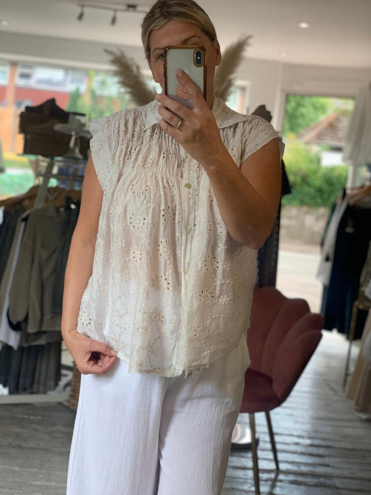 Broderie anglaise cap sleeve blouse